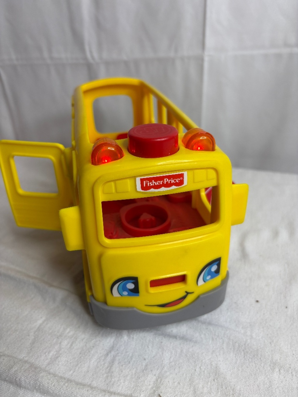 The 2016 Fisher Price Little People Sit With Me School Bus is a fun and interact